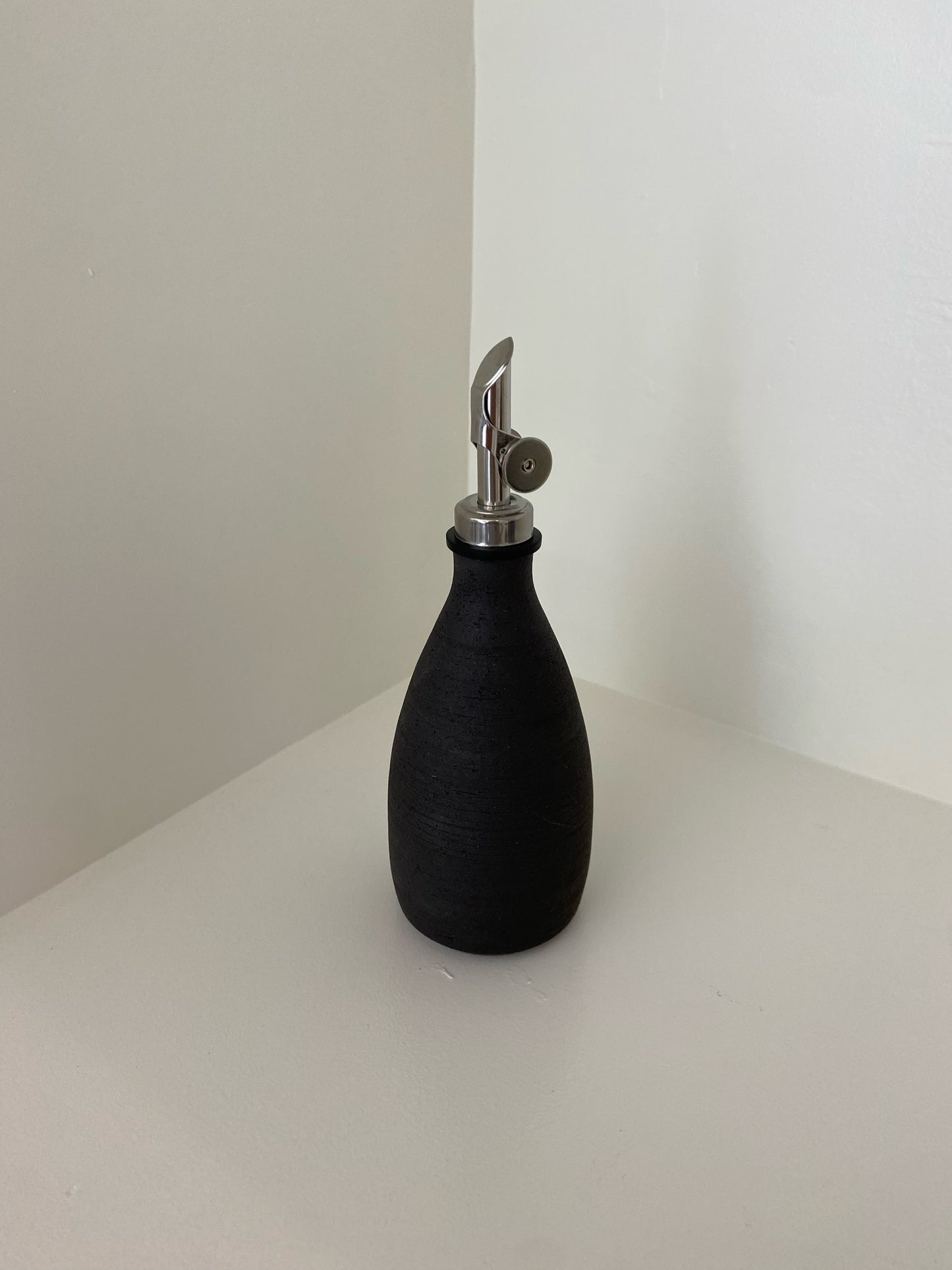 ELI WEST Dark Cruet 06